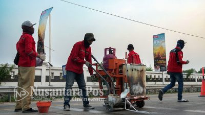 Polisi Pasang Garis Kejut di Jalur Arteri Perak Jombang, Antisipasi Balap Liar